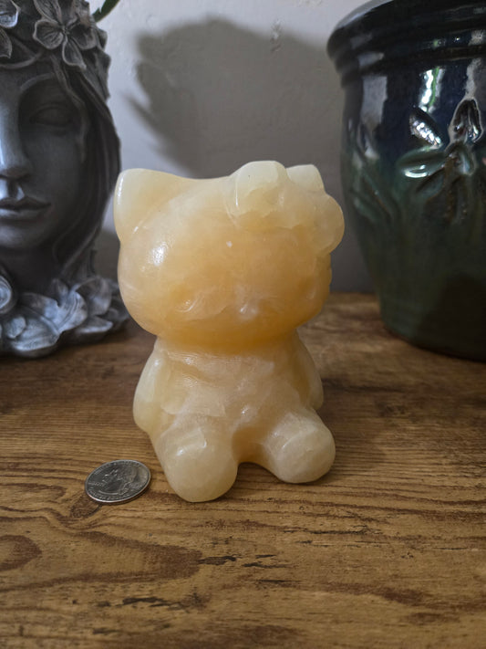 Orange Calcite Hello Kitty Carving